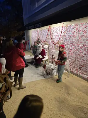 Santa photo stop at a decorated Middletown storefront