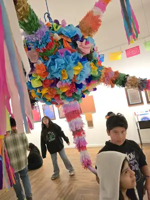 Colorful piñata activity during the holiday celebration